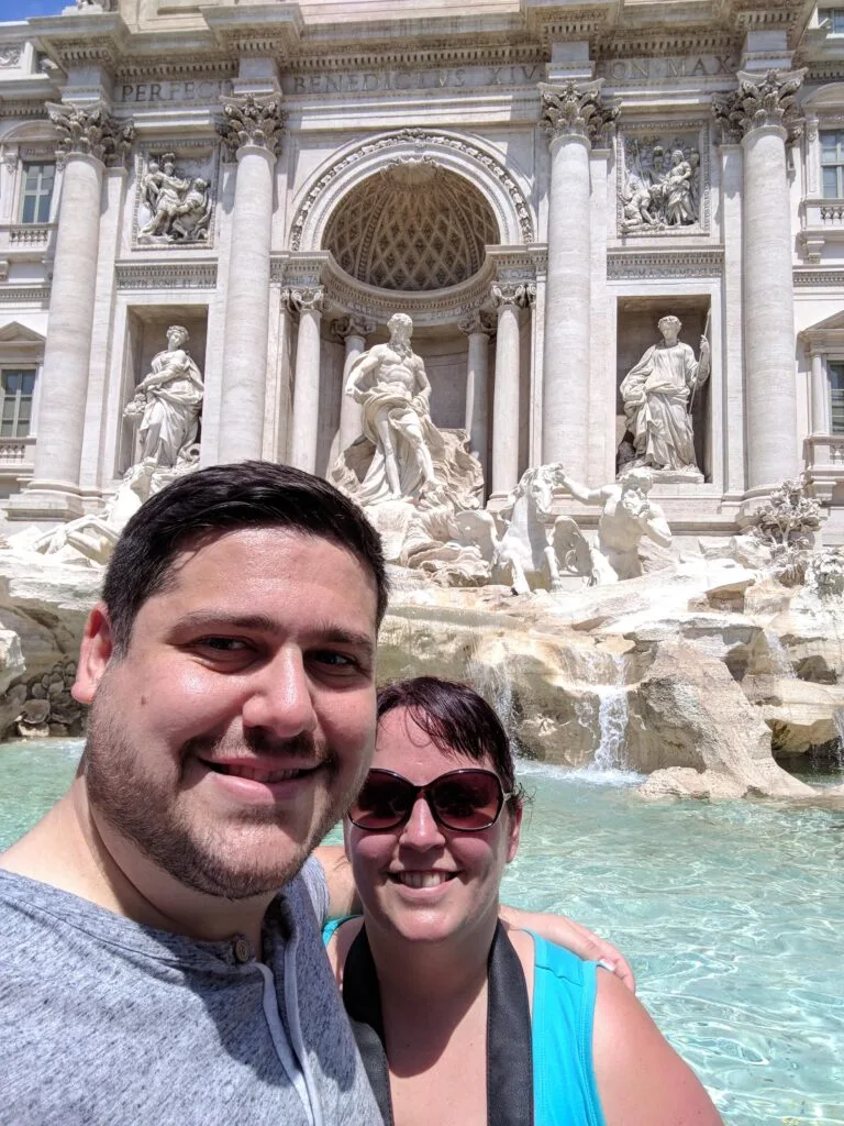 Spencer & I in front of the Trevi fountain. Wear sunglasses and comfortable shoes. This 3 days in Rome itinerary is a fast-paced one!