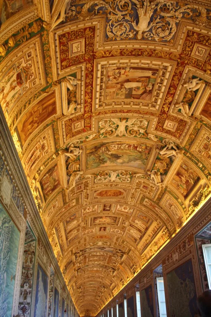 The Hallway of Maps in the Vatican was my favorite ceiling. You can take pictures of everything, until you get to the Sistine Chapel - photos are forbidden. 3 Days in Rome itinerary day 2.