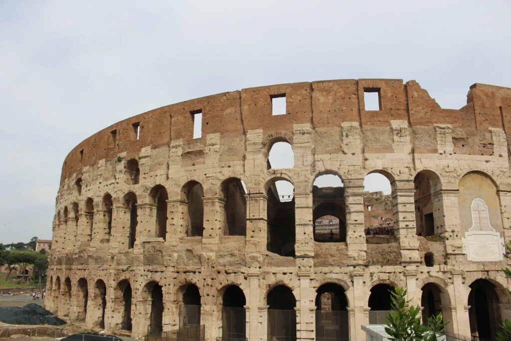 The multi-level arched structure of the ancient Roman Colosseum.