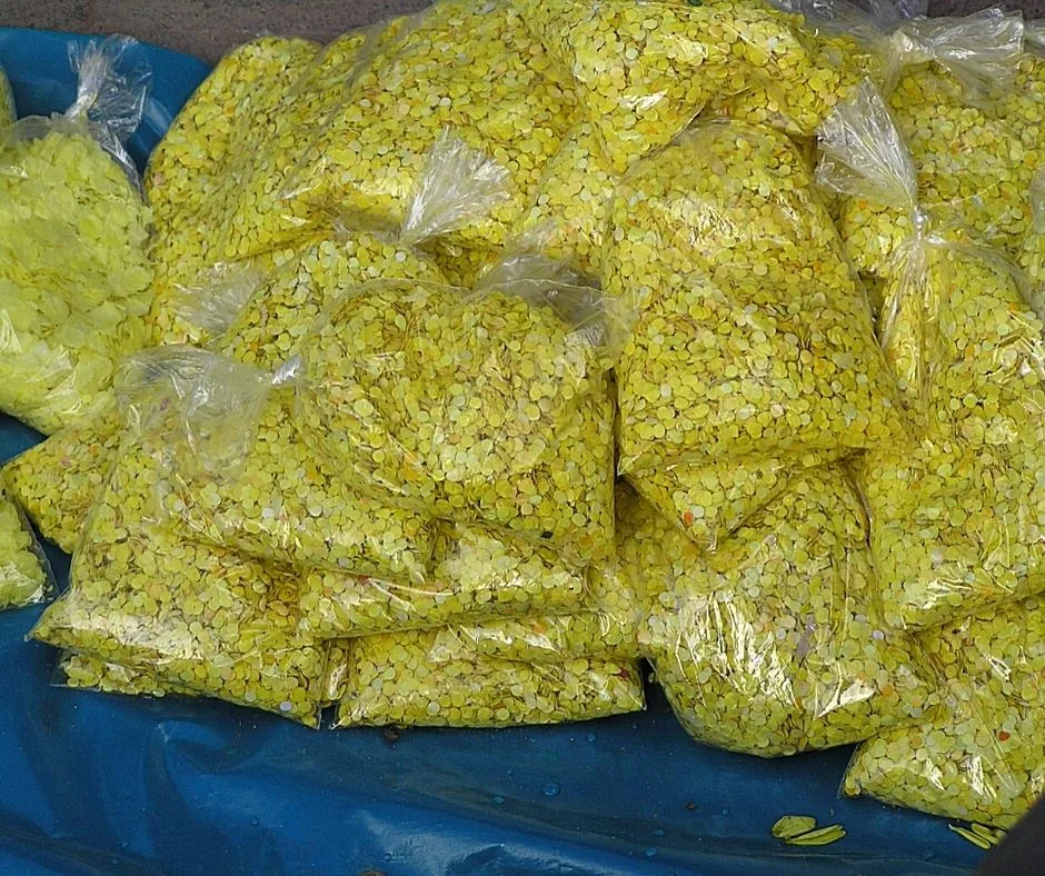 Bags of yellow confetti. Sprinkle on your doorstep for good luck throughout the new year. New Years Traditions around the world. 