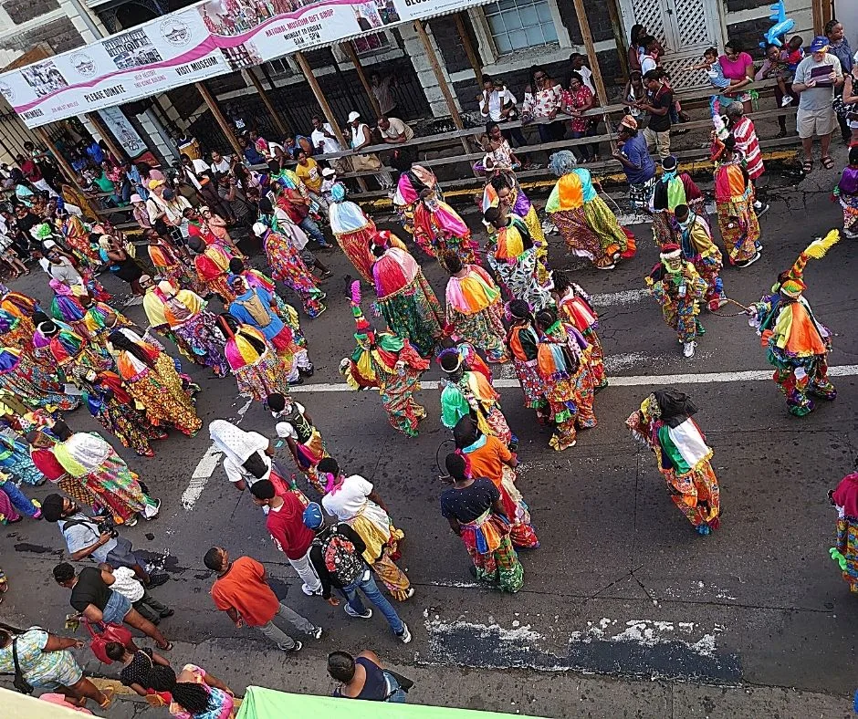 A colorful parade is a highlight of NYE in St. Kitt's - one of the best places to spend New Years Eve