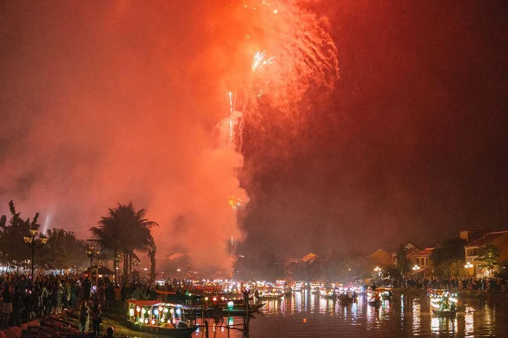 Watching fireworks from boats in Vietnam is one of the best places to celebrate NYE around the world. 