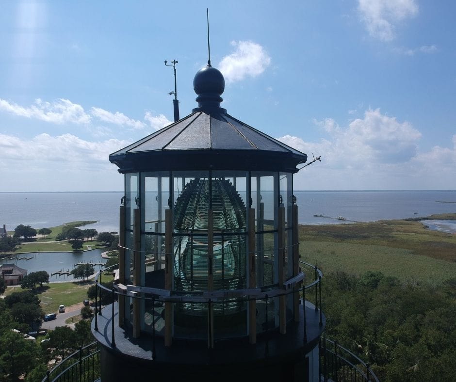 Drone shot of the top of Currituck lighthouse - is one of the best things to do in Corolla, NC 