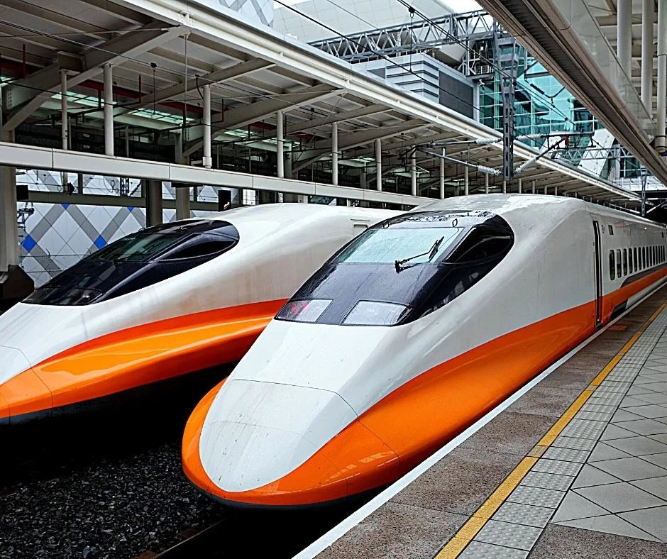 Photo of two bullet trains in a station