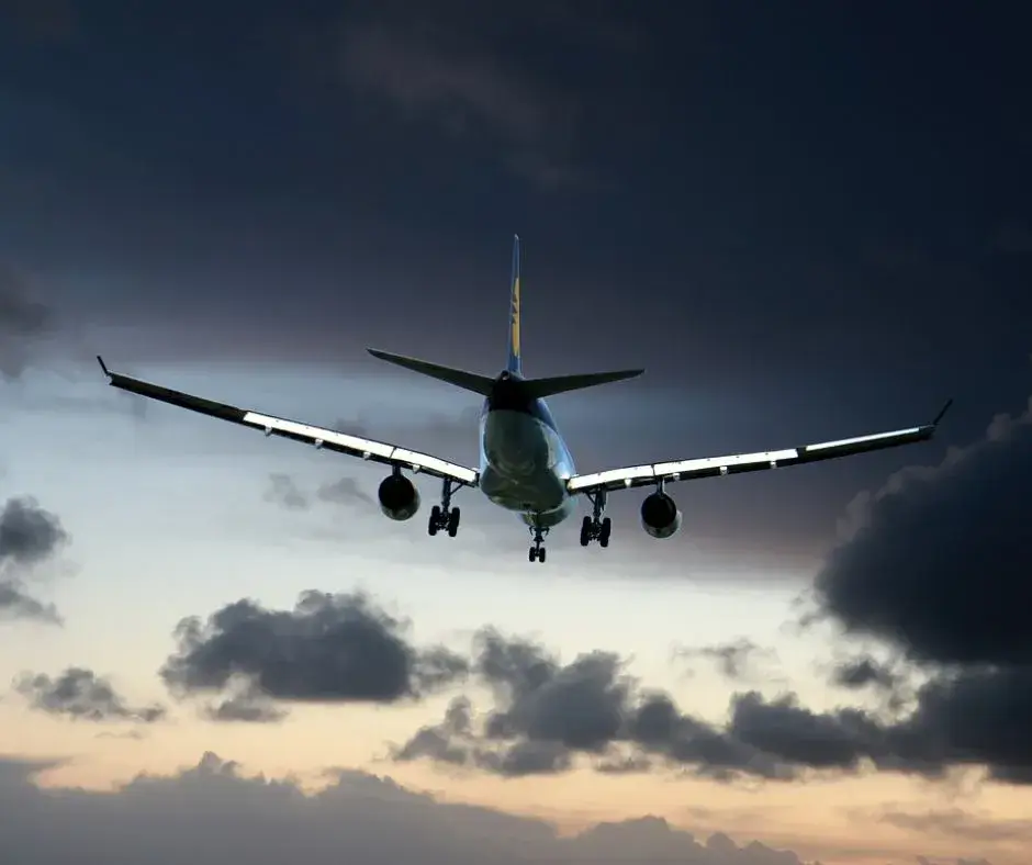 A plane flying through clouds