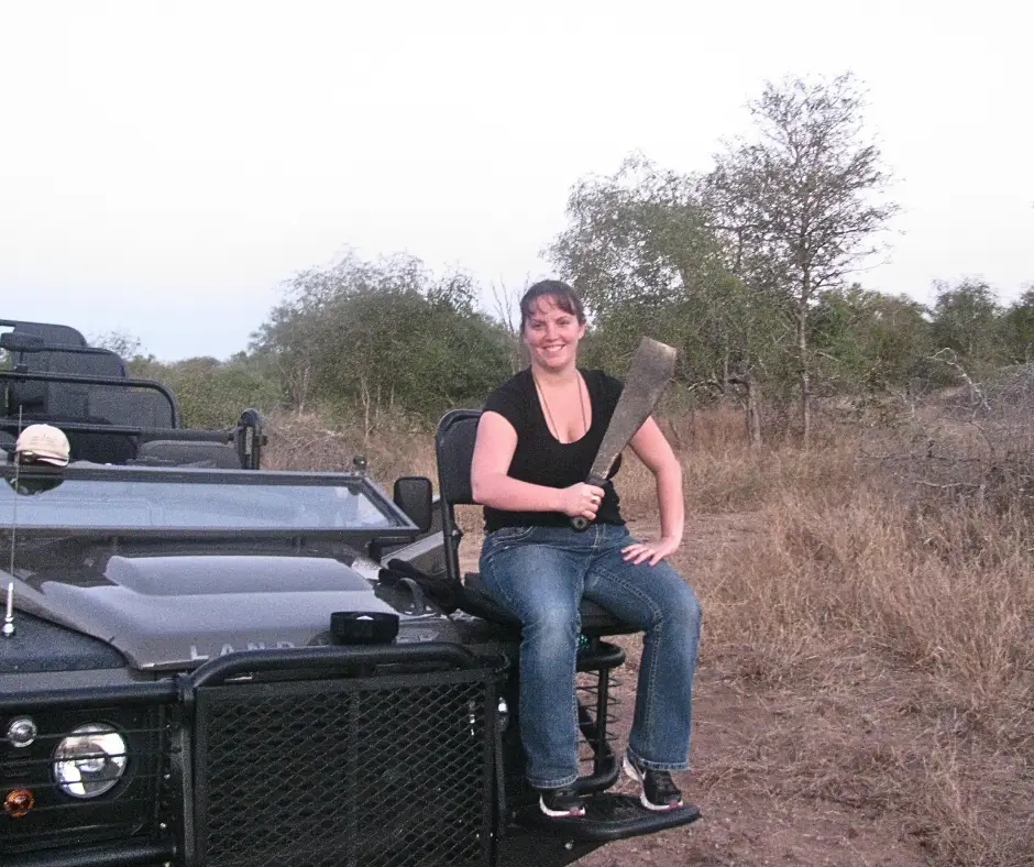 Me pretending to be a tracker on the seat at the front of the jeep. 