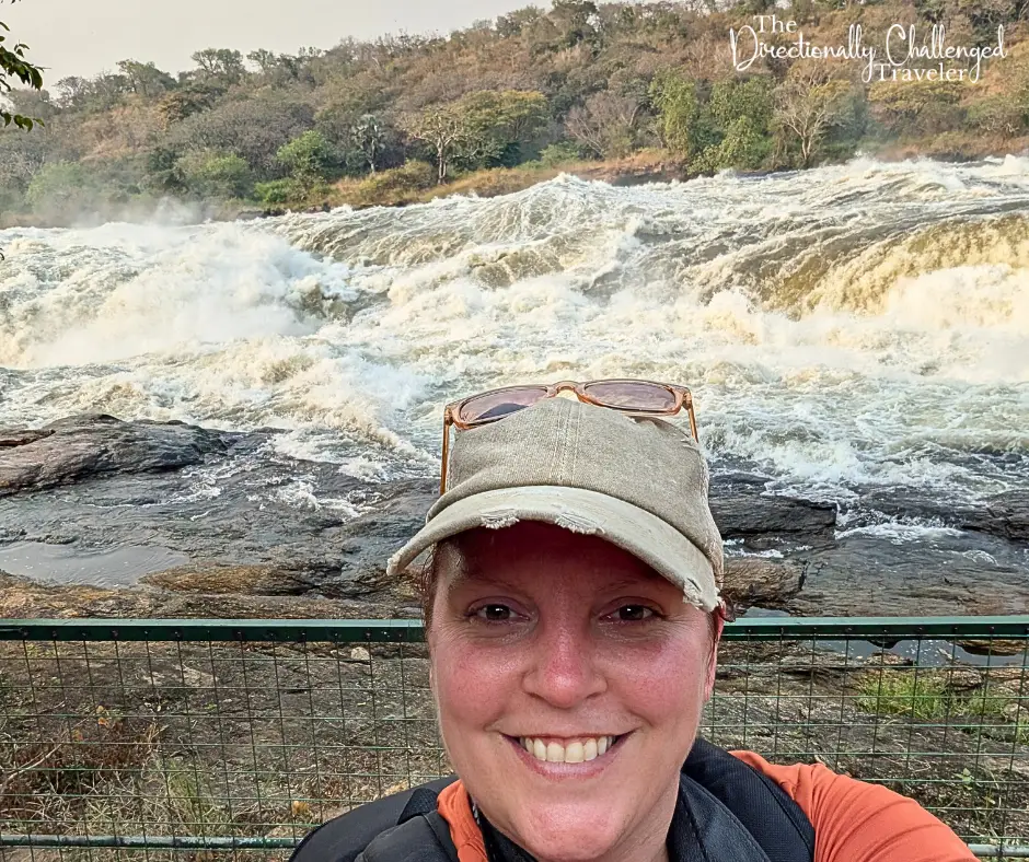 Pam standing at top of the falls. 