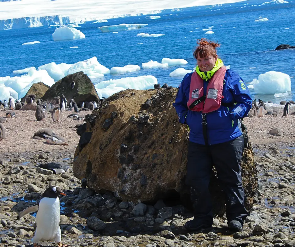 Me with a penguin in Antarctica. 