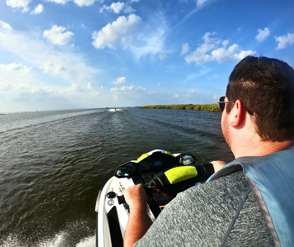 Spencer driving a jet ski on our tour in the outer banks